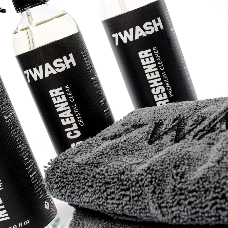 Detail of 7WASH interior bottles with a microfiber towel